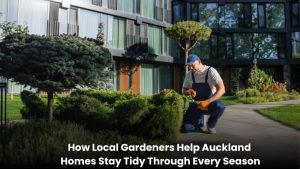 Professional gardener maintaining a tidy residential garden in Auckland during seasonal garden care.